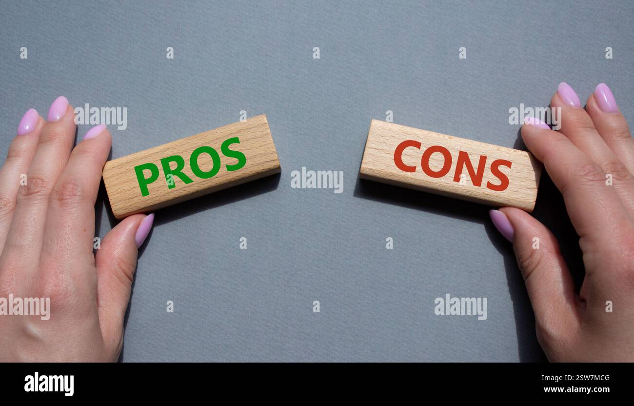 Pros vs Cons symbol. Concept word Pros vs Cons on wooden blocks ...