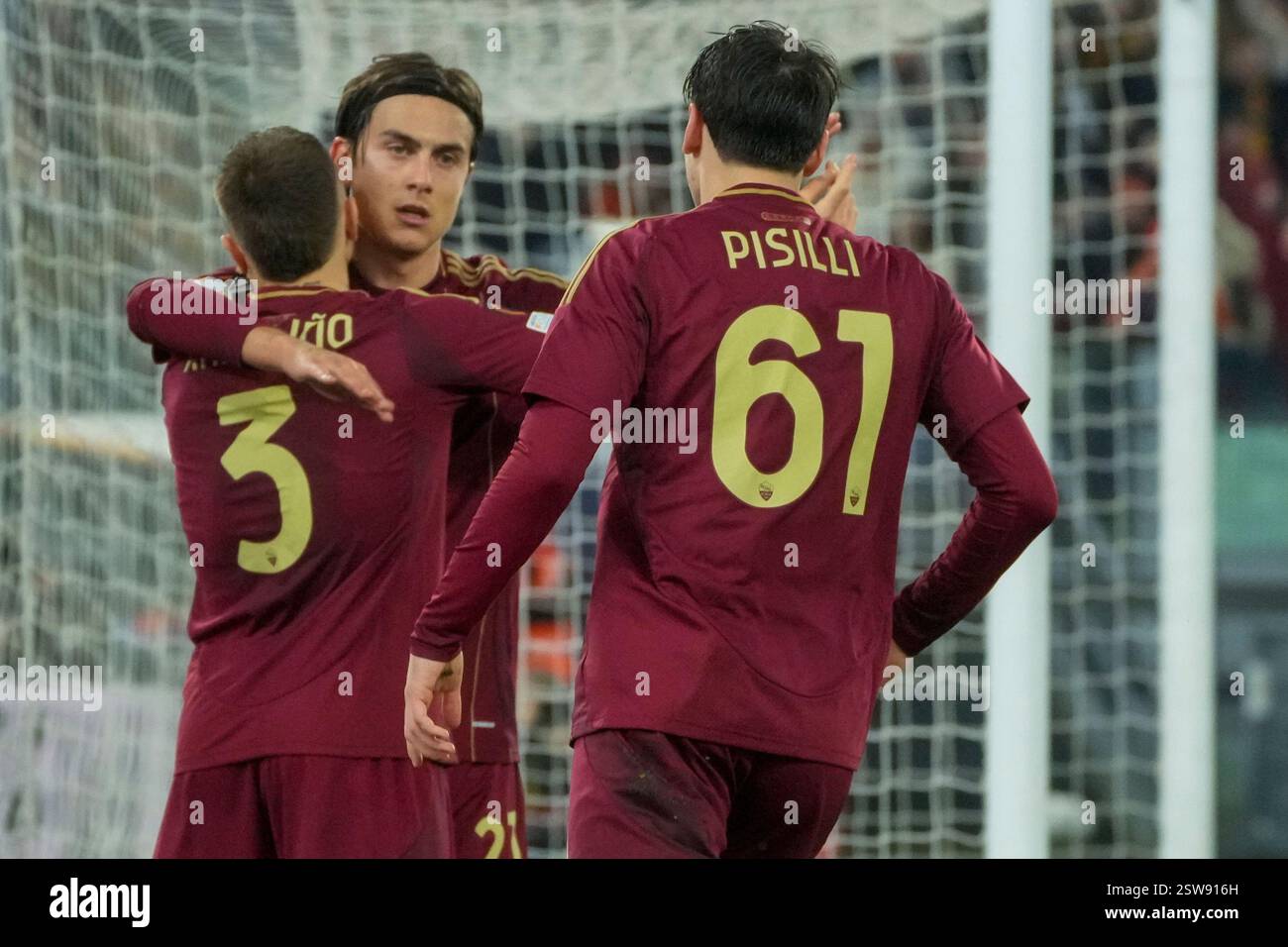 Roma's Niccolo Pisilli, right, celebrates with teammates after scoring ...