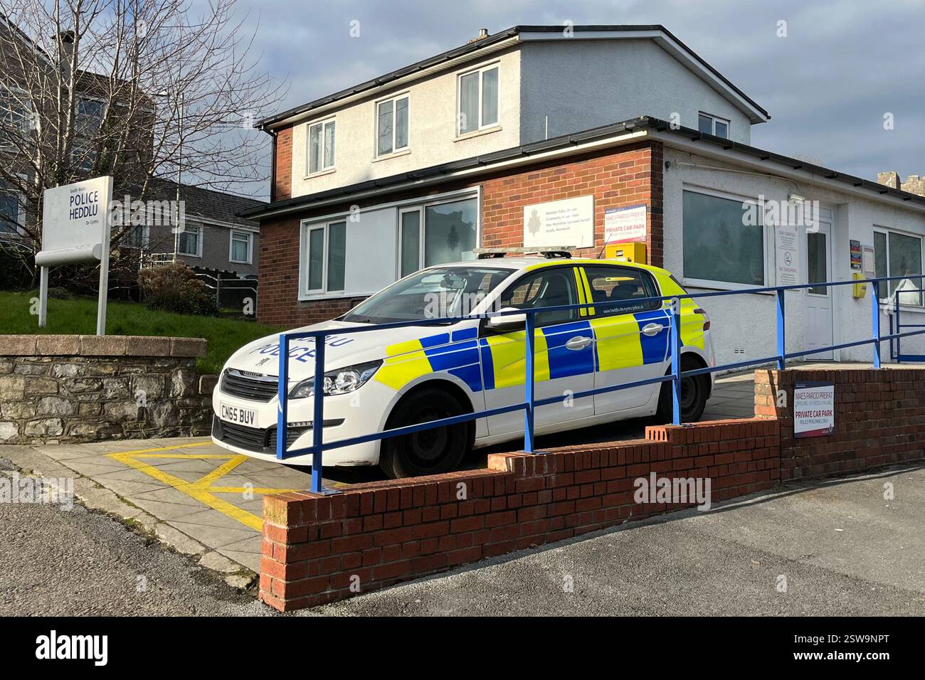 A Police Car parked outside Mumbles Police Station. Swansea, Wales, United Kingdom. - Smartphone Captured Stock Image