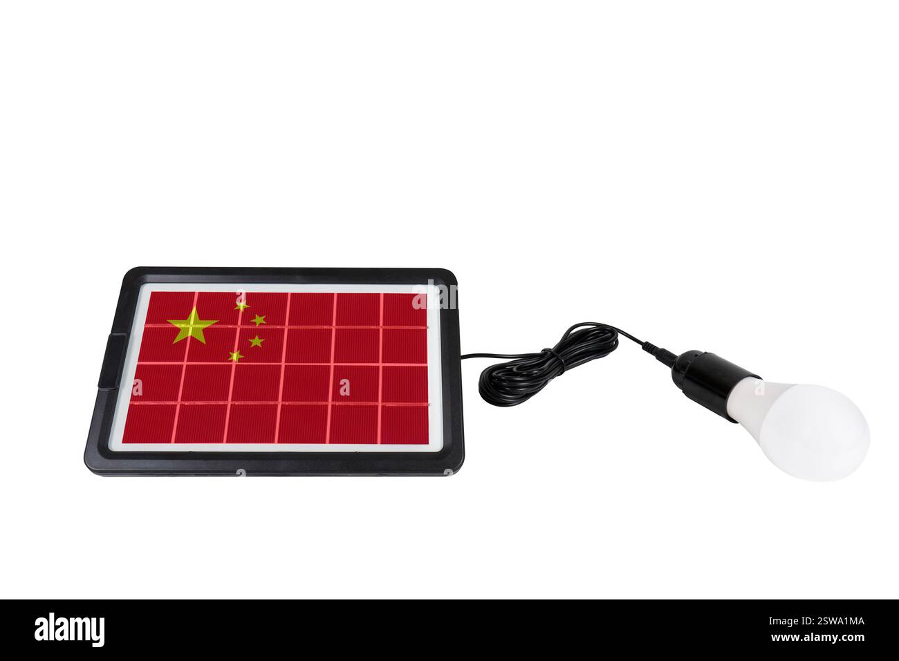 Portable solar panel in the shape of China flag connected to light bulb isolated on white background (close-up). Concept of renewable energy Stock Photo