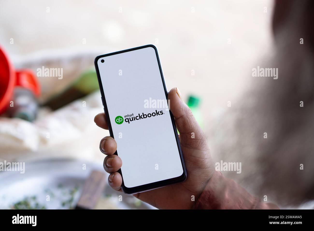 Dhaka, Bangladesh- 15 Oct 2024: Intuit quickbooks logo is displayed on smartphone. QuickBooks is an accounting software. Stock Photo