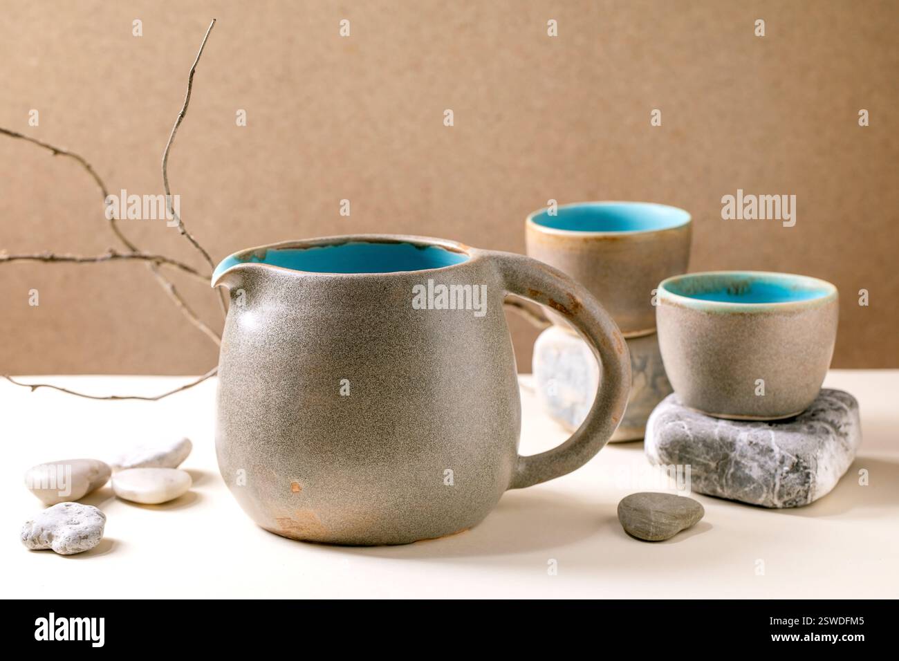 Set of empty grey ceramic cups Stock Photo