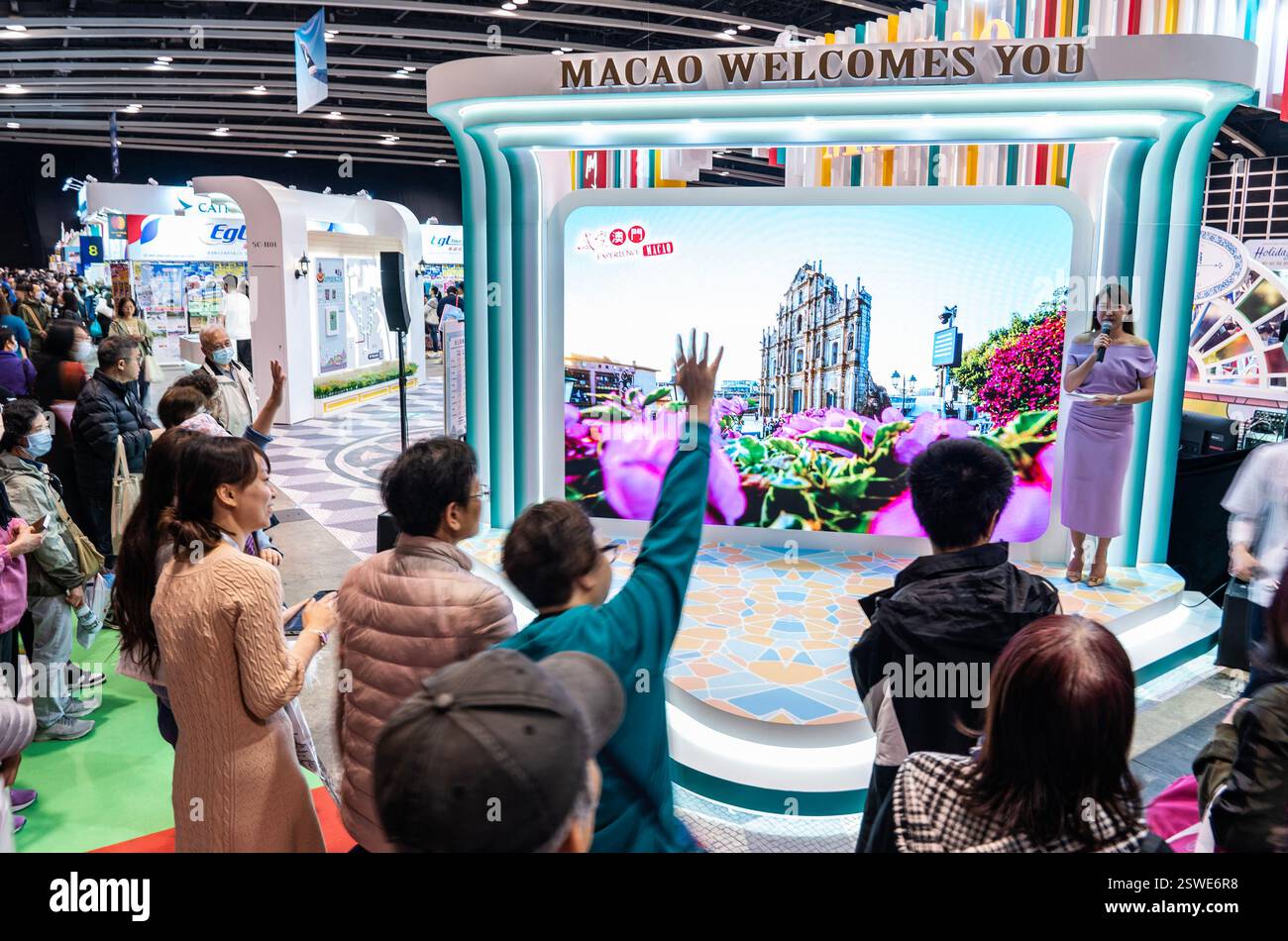 Hong Kong,China.20th February 2025. People visit the booth of the Macao Government Tourism Office during the Hong Kong Holiday And Travel Expo 2025 at Hong Kong Convention and Exhibition Centre on February 20, 2025 in Hong Kong, China. Hong Kong Holiday and Travel Expo 2025 will be held from February 20 to February 23. Credit: Hou Yu/China News Service/Alamy Live News Stock Photo