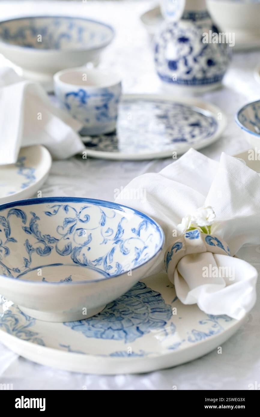 Easter table setting with empty craft ceramic tableware Stock Photo