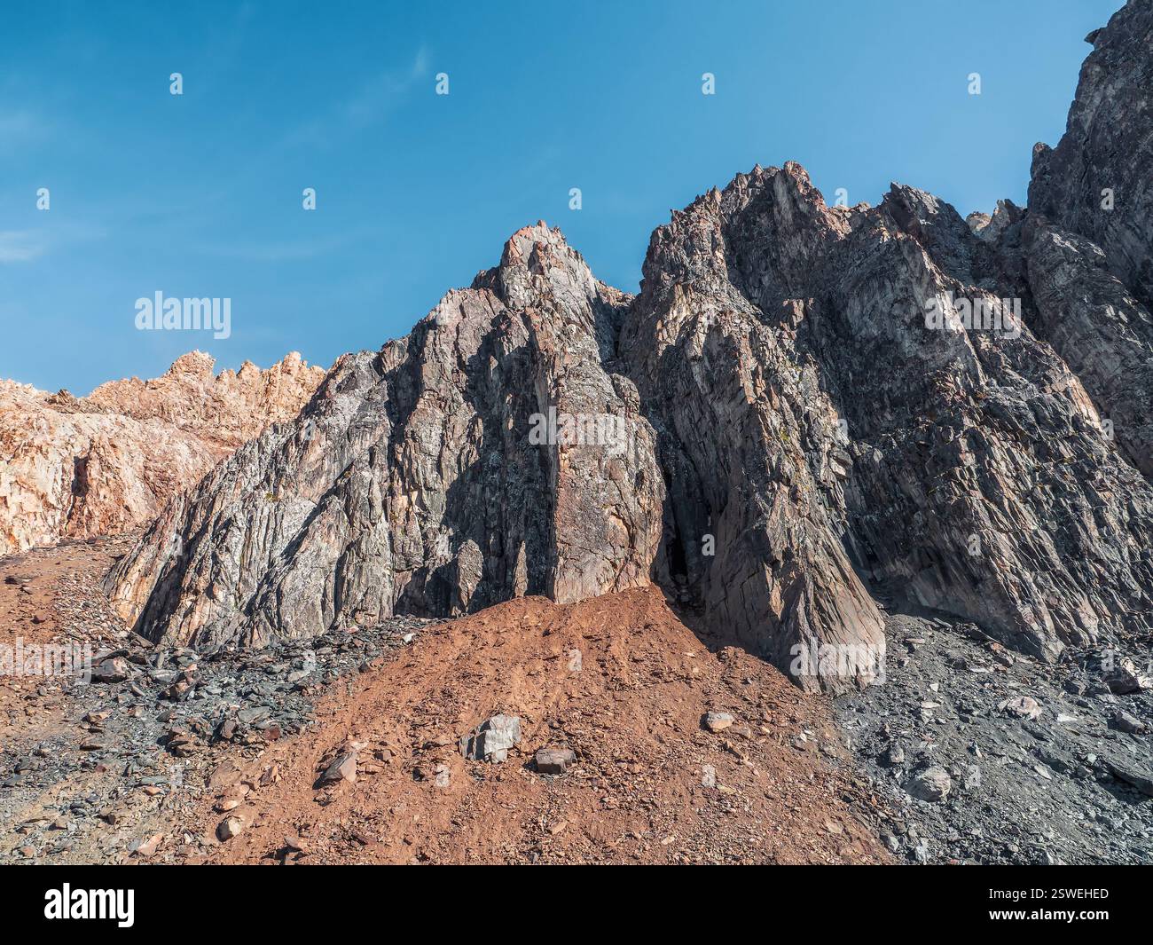 Crumbling rock. Abstract crumbling cliff rock formation. Eroding rock cliffs. Stock Photo