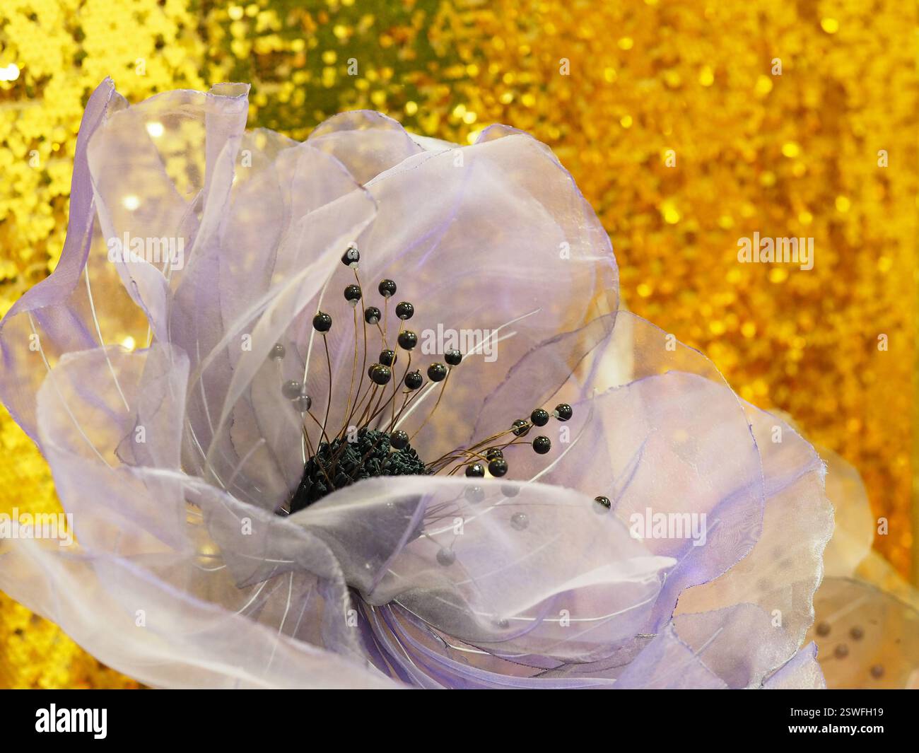 Flowers from organza for interior decoration. Close up. Stock Photo