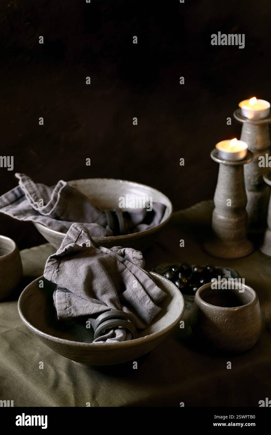 Rustic table setting with craft ceramic tableware Stock Photo