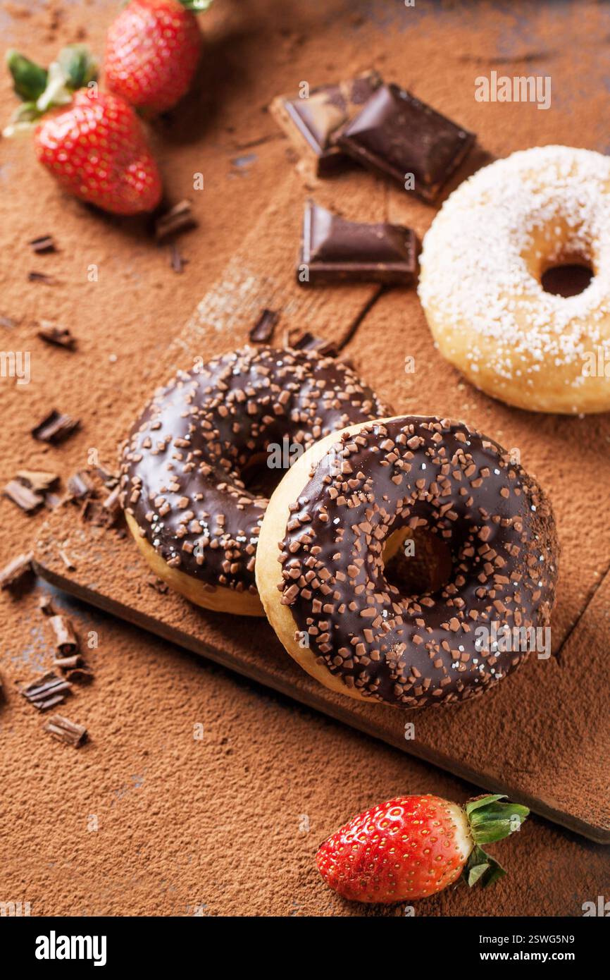 Donuts with fresh strawberries and chocolate Stock Photo