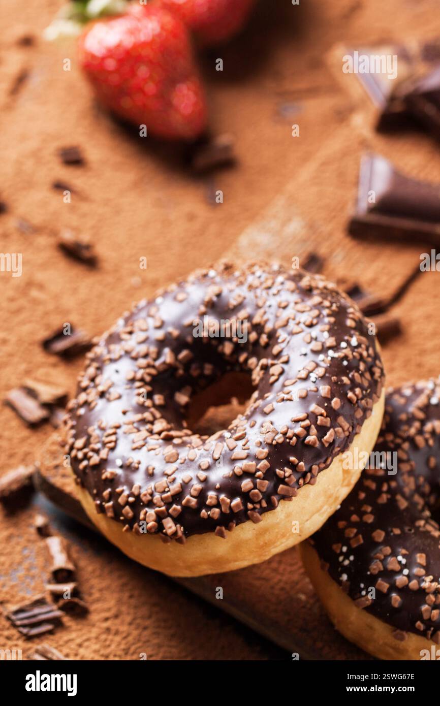 Donuts with fresh strawberries and chocolate Stock Photo