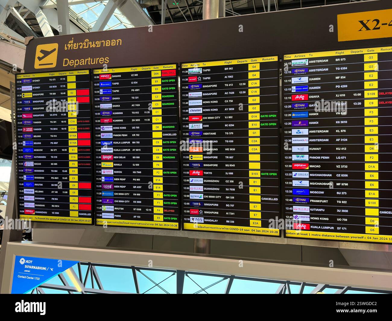 Bangkok, Thailand - Jan 4, 2024: Departure board in Suvarnabhumi International Airport. - Smartphone Captured Stock Image