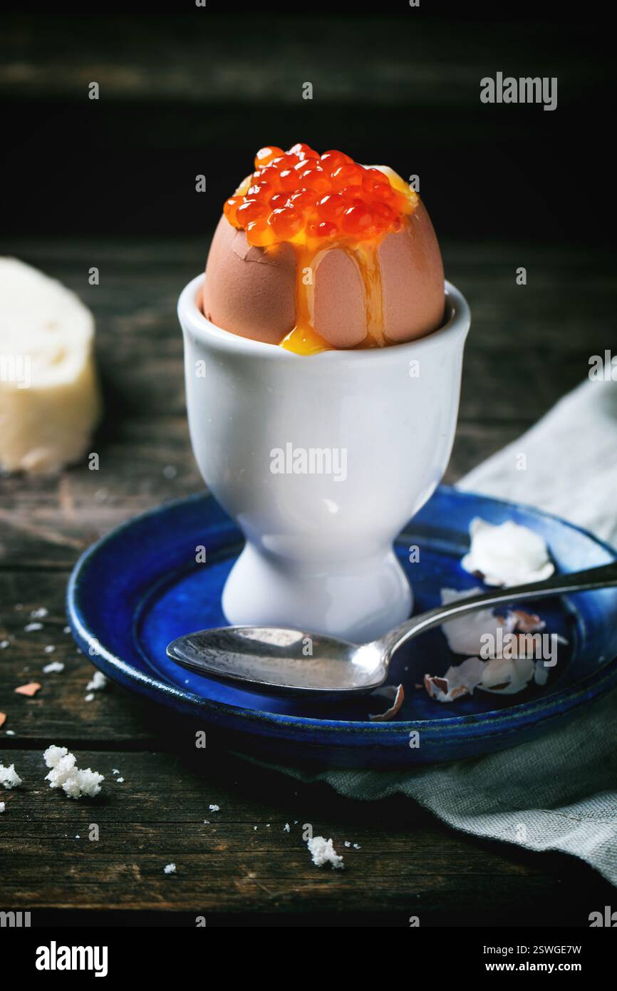 Soft-boiled egg with red caviar Stock Photo