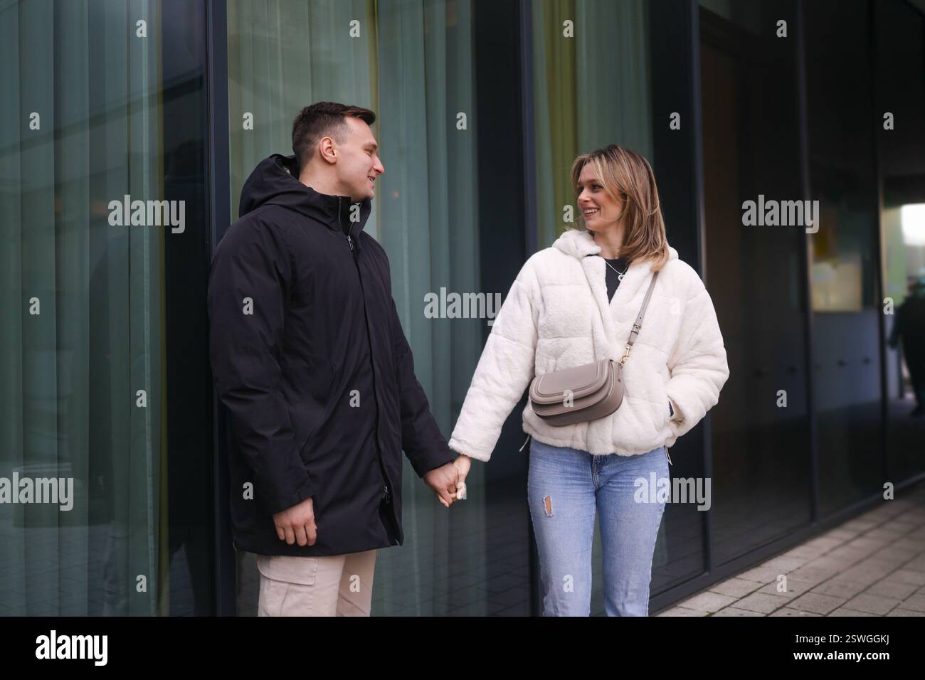 Sweethearts in love holding hands Stock Photo