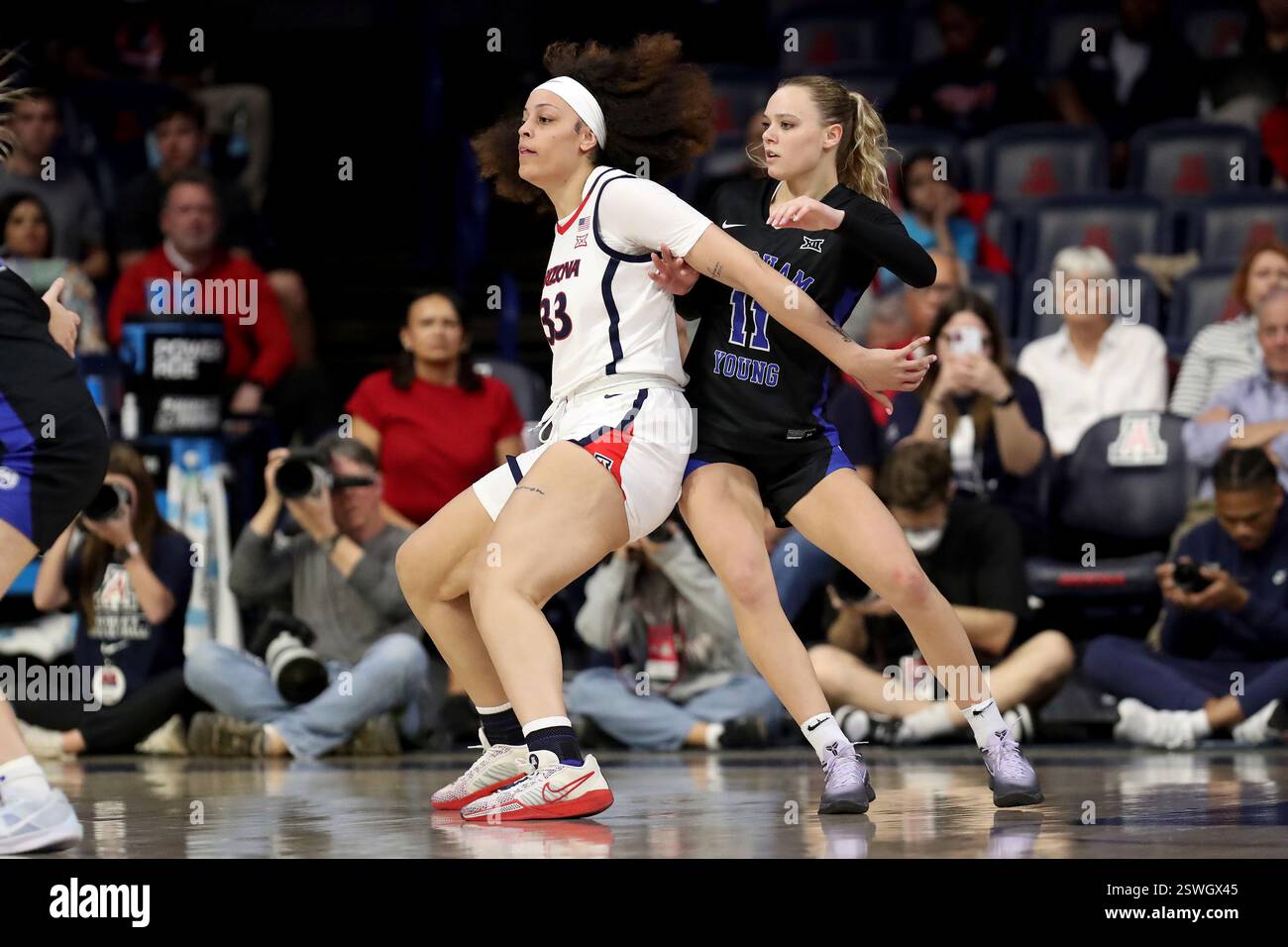 TUCSON, AZ - FEBRUARY 19: Arizona Wildcats forward Isis Beh #33 and BYU ...