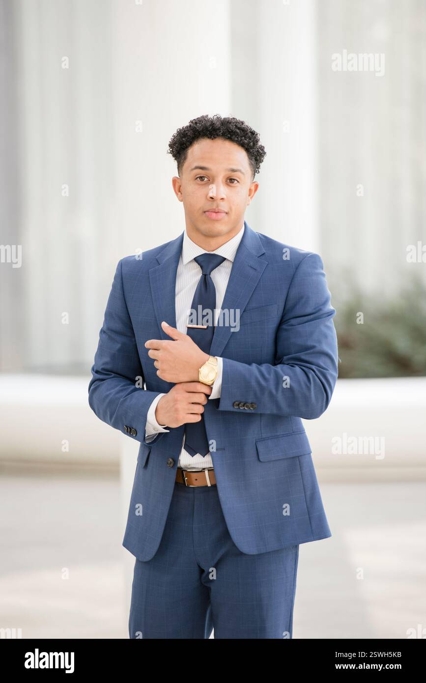 Confident man in suit with serious expression Stock Photo