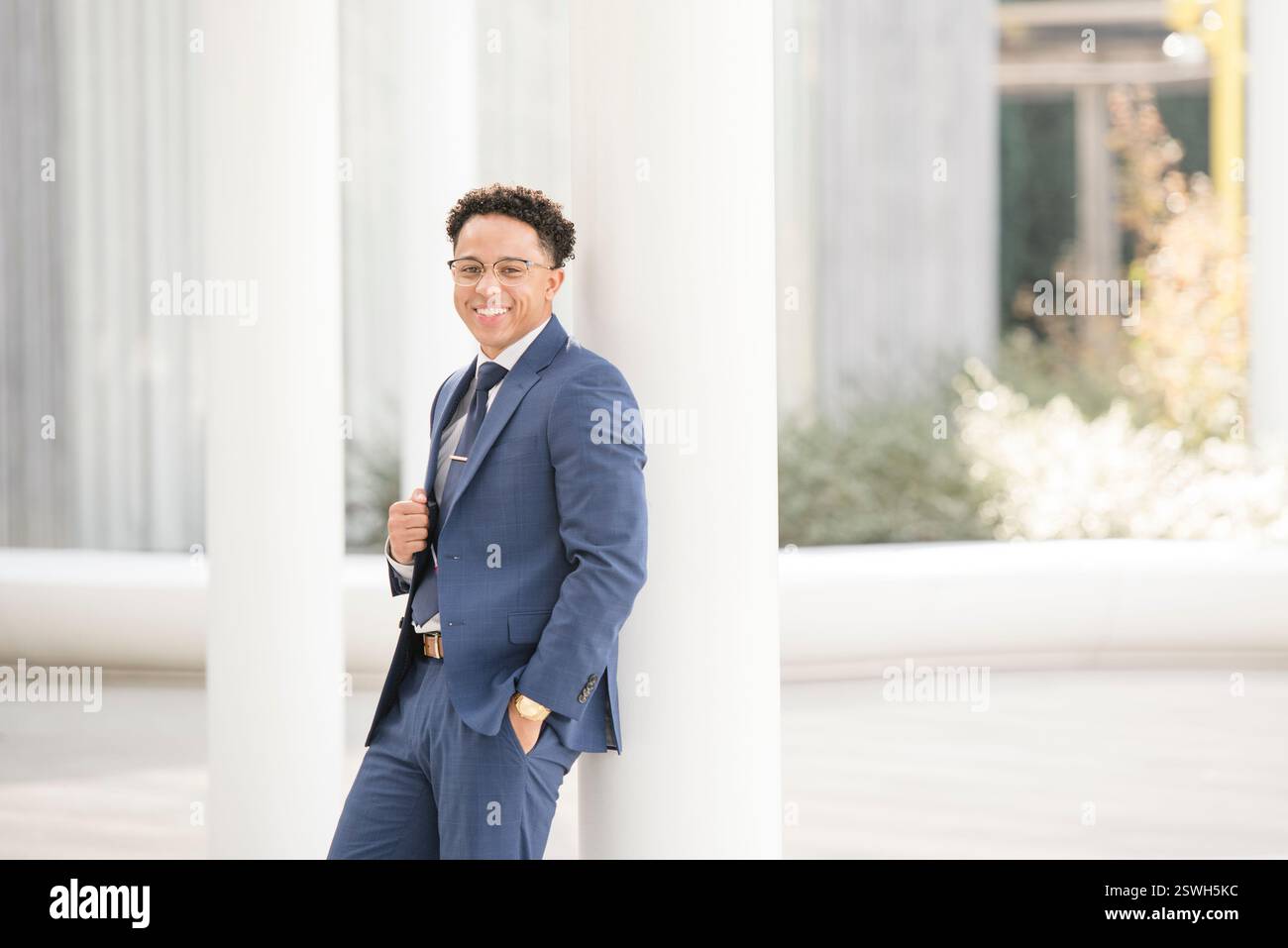 Confident young professional in a stylish blue suit Stock Photo