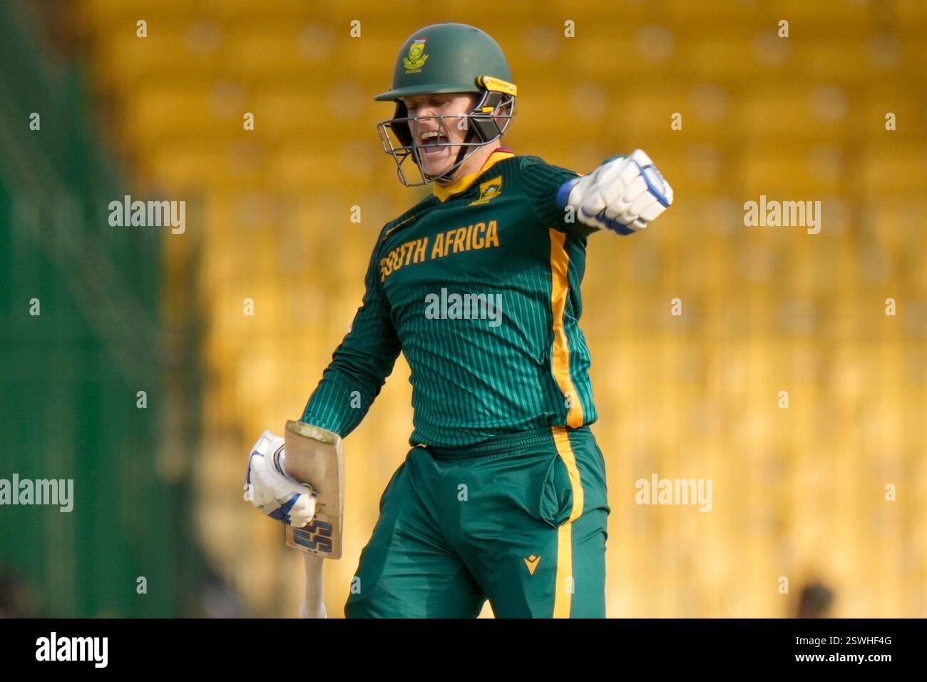 South Africa's Ryan Rickelton celebrates after scoring century during ...
