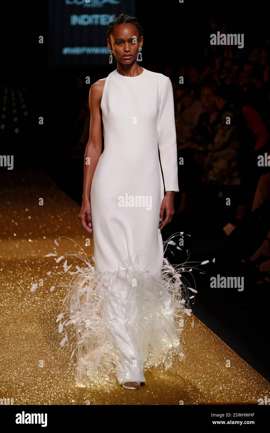 Madrid, Spain. 21th Feb, 2025. A model walks the fashion runway during ...
