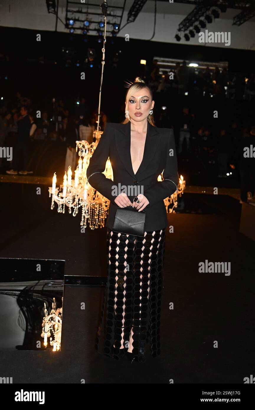 Madrid, Spain. 21st Feb, 2025. A model wears at collection runway a ...