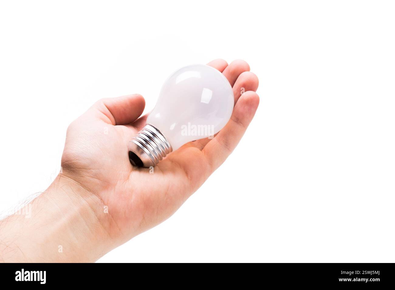 Hand holding an light bulb on white background Stock Photo - Alamy