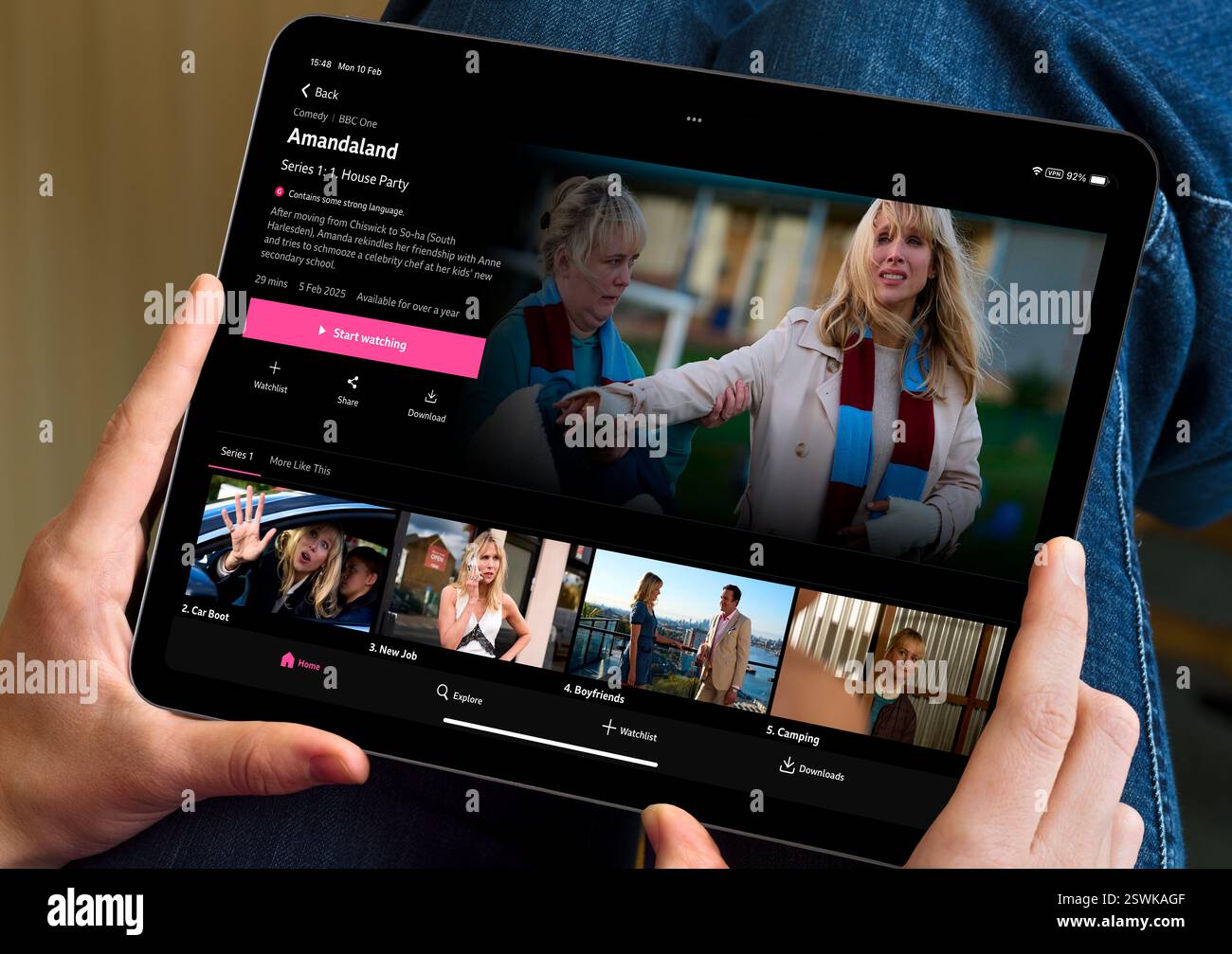 Watching BBC iPlayer app on an Apple iPad Stock Photo