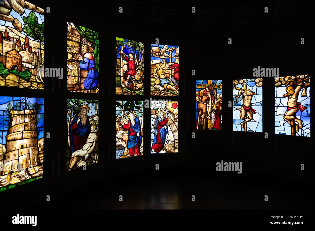 Milan, Italy - 28 July 2024: colored glass windows of the Duomo church ...
