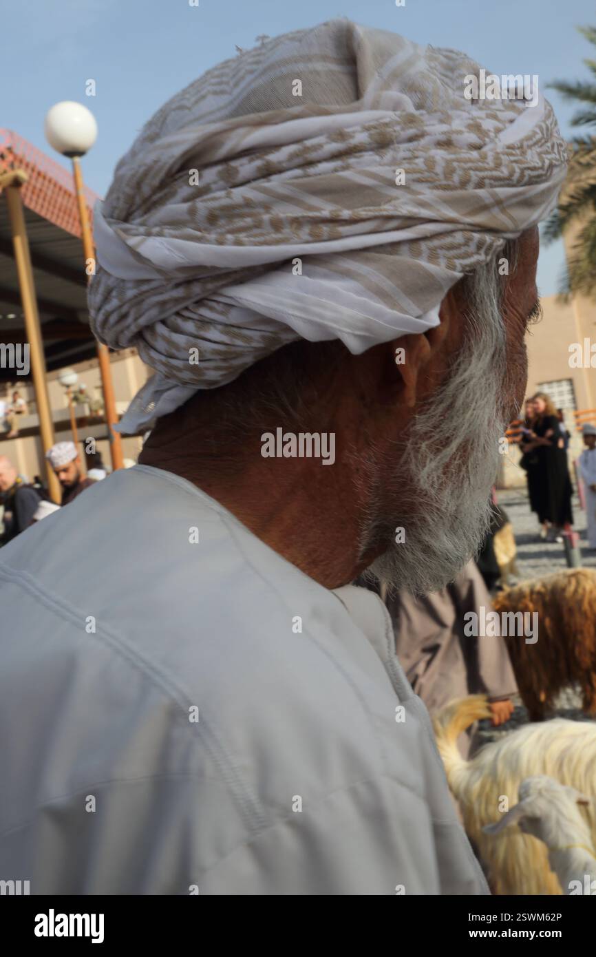 elderly-omani-man-wearing-a-mussar-nizwa-livestock-market-nizwa-oman