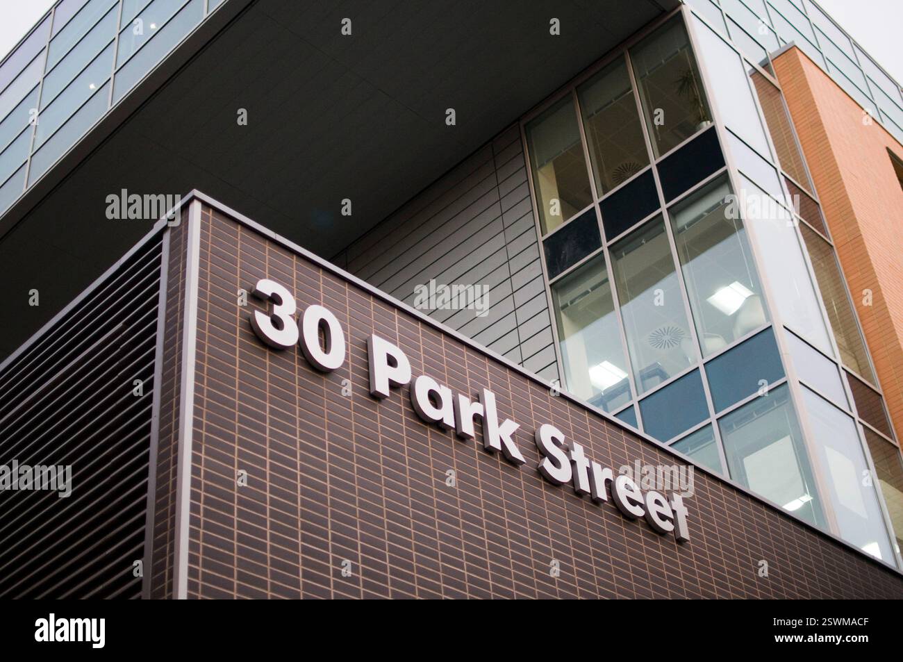 30 Park Street, building facade, likely in Manchester, UK. Address sign ...