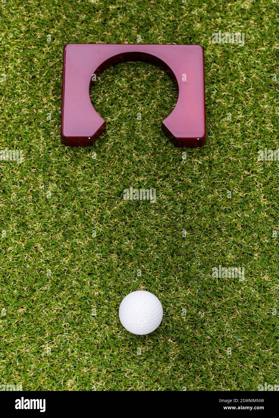 Indoor mini golf equipment set on green grass background Stock Photo