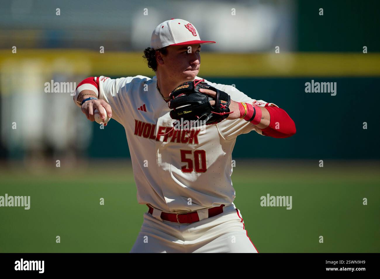 NC State Wolfpack infielder Brandon Novy (50) throws to first base ...