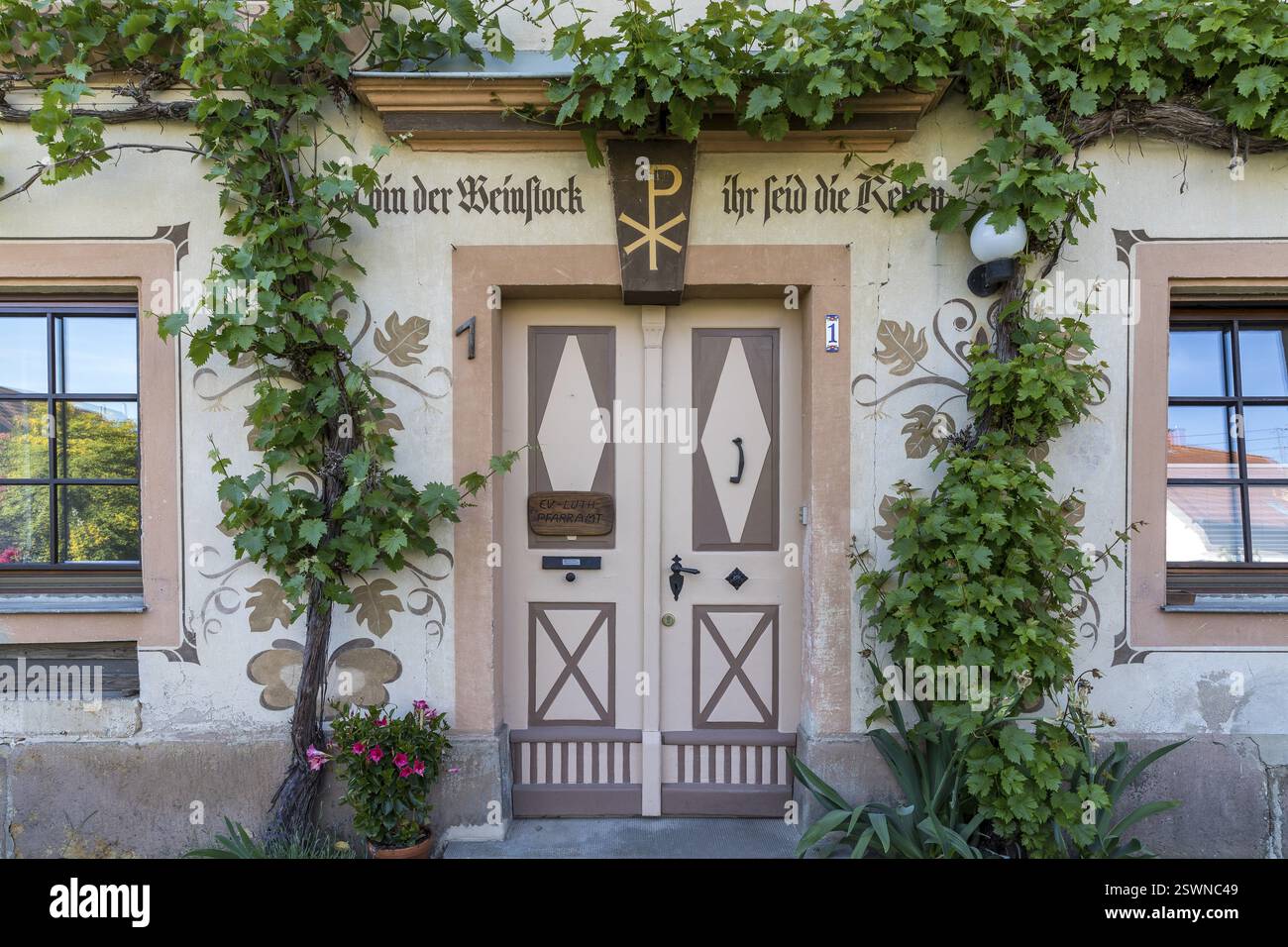 Door of the vicarage with Bible verse I am the vine, you are the branches, Struppen, Saxon Switzerland, Saxony, Germany, Europe Stock Photo