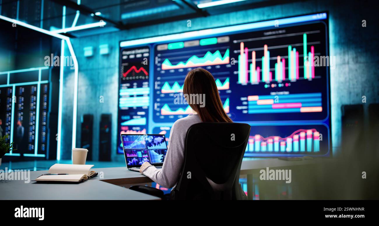 Analyzing Market Trends On A Business Analytics Dashboard As A Manager. Stock Photo