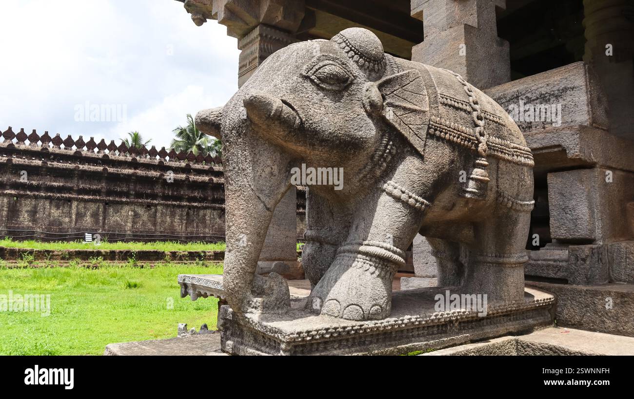 India, Karnataka, Mudbidri, View of Huge Carved Sculptures of Elephants in Front of Saavira Kambada Chandranatha Swamy Basadi, With Carved Details on . Stock Photo