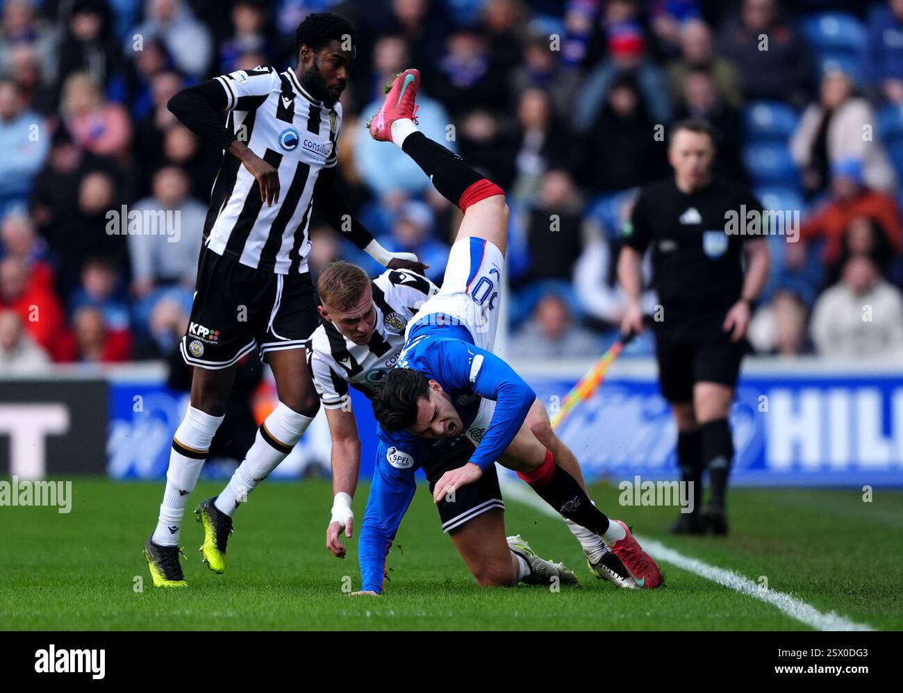 St Mirren's Killian Phillips challenges Rangers' Ianis Hagi (right ...