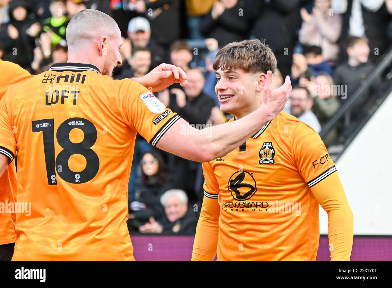 Ryan Loft Josh Stokes (22 Cambridge United) celebrates with Ryan Loft (18 ...