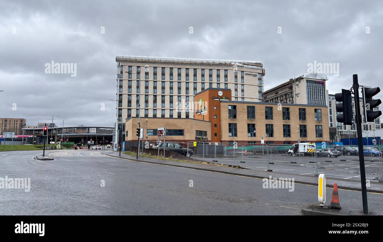 Glasgow city centre views of iconic buildings and famous tourist attractions in the rain. Dull overcast day. Grim Scottish city - Smartphone Captured Stock Image