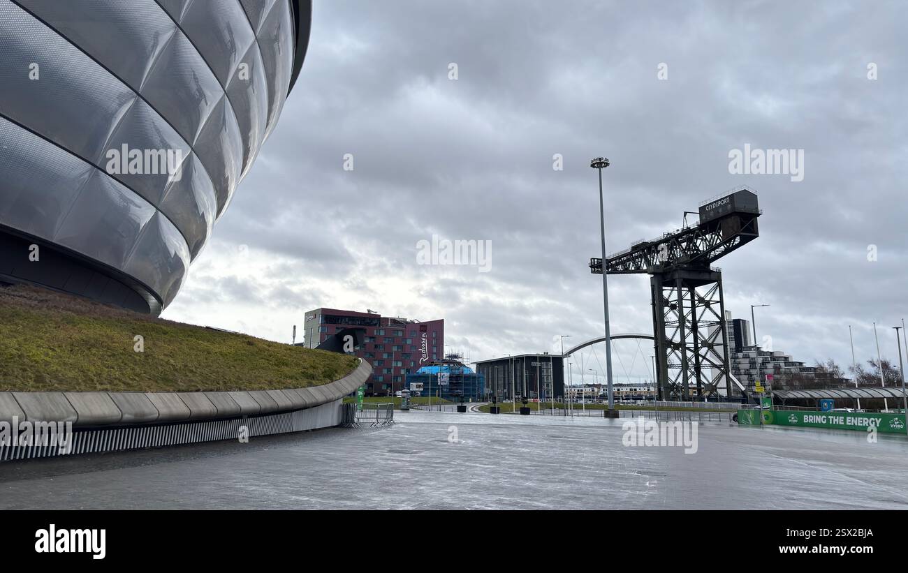 Glasgow city centre views of iconic buildings and famous tourist attractions in the rain. Dull overcast day. Grim Scottish city - Smartphone Captured Stock Image