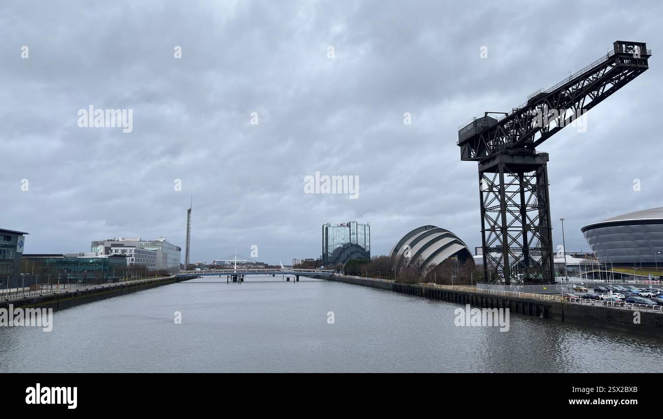 Glasgow city centre views of iconic buildings and famous tourist attractions in the rain. Dull overcast day. Grim Scottish city - Smartphone Captured Stock Image