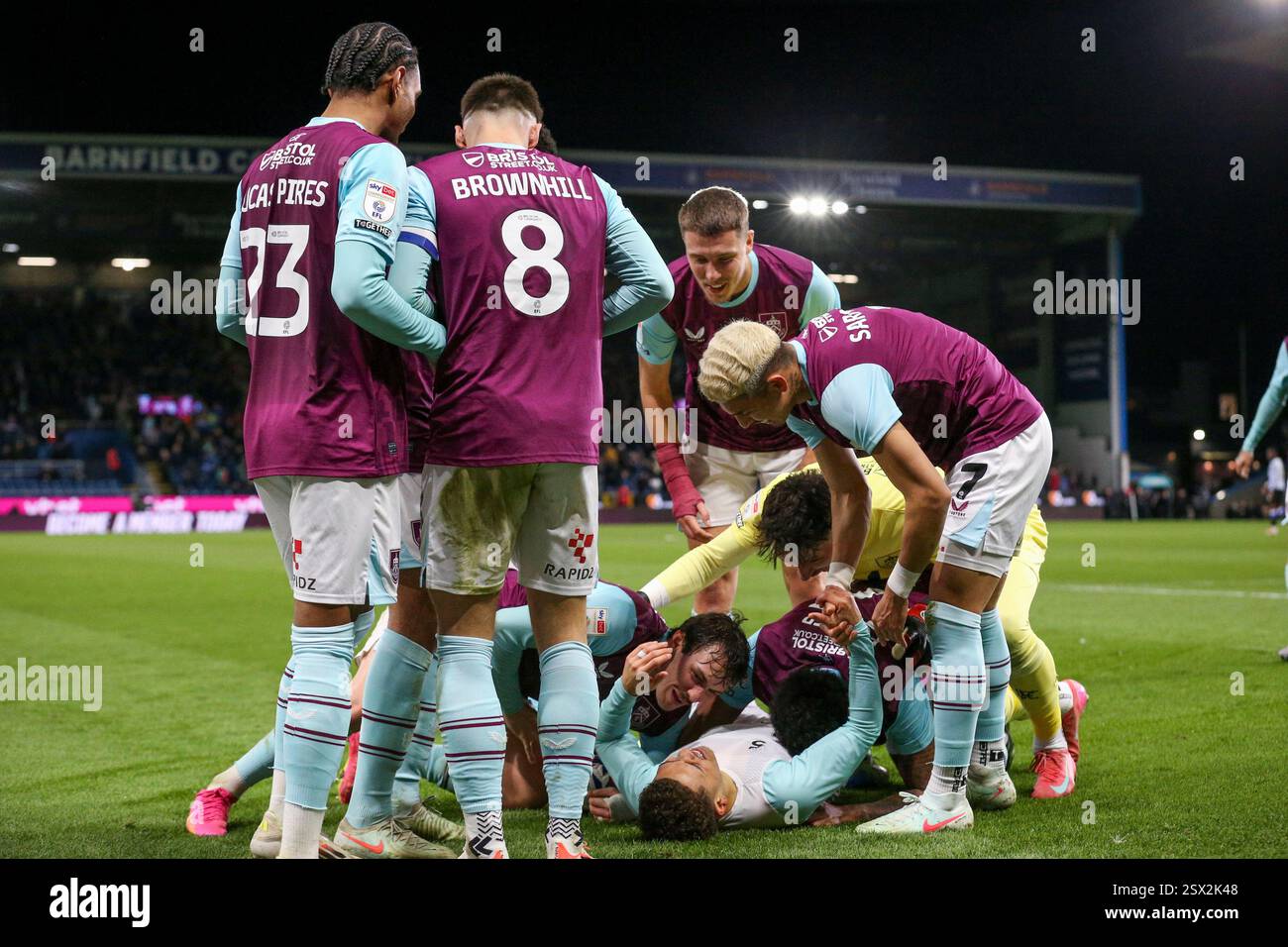 Burnley, UK. 21st Feb, 2025. Burnley forward Manuel Benson (10) scores a GOAL 4-0 and celebrates with Burnley midfielder Jeremy Sarmiento (7) Burnley midfielder Josh Brownhill (8) Burnley defender Lucas Pires (23) Burnley defender Connor Roberts (14) Burnley goalkeeper James Trafford (1) during the Burnley FC v Sheffield Wednesday FC skybet EFL Championship match at Turf Moor, Burnley, England, United Kingdom on 21 February 2025 Credit: Phil Duncan/Every Second Media Credit: Every Second Media/Alamy Live News Stock Photo