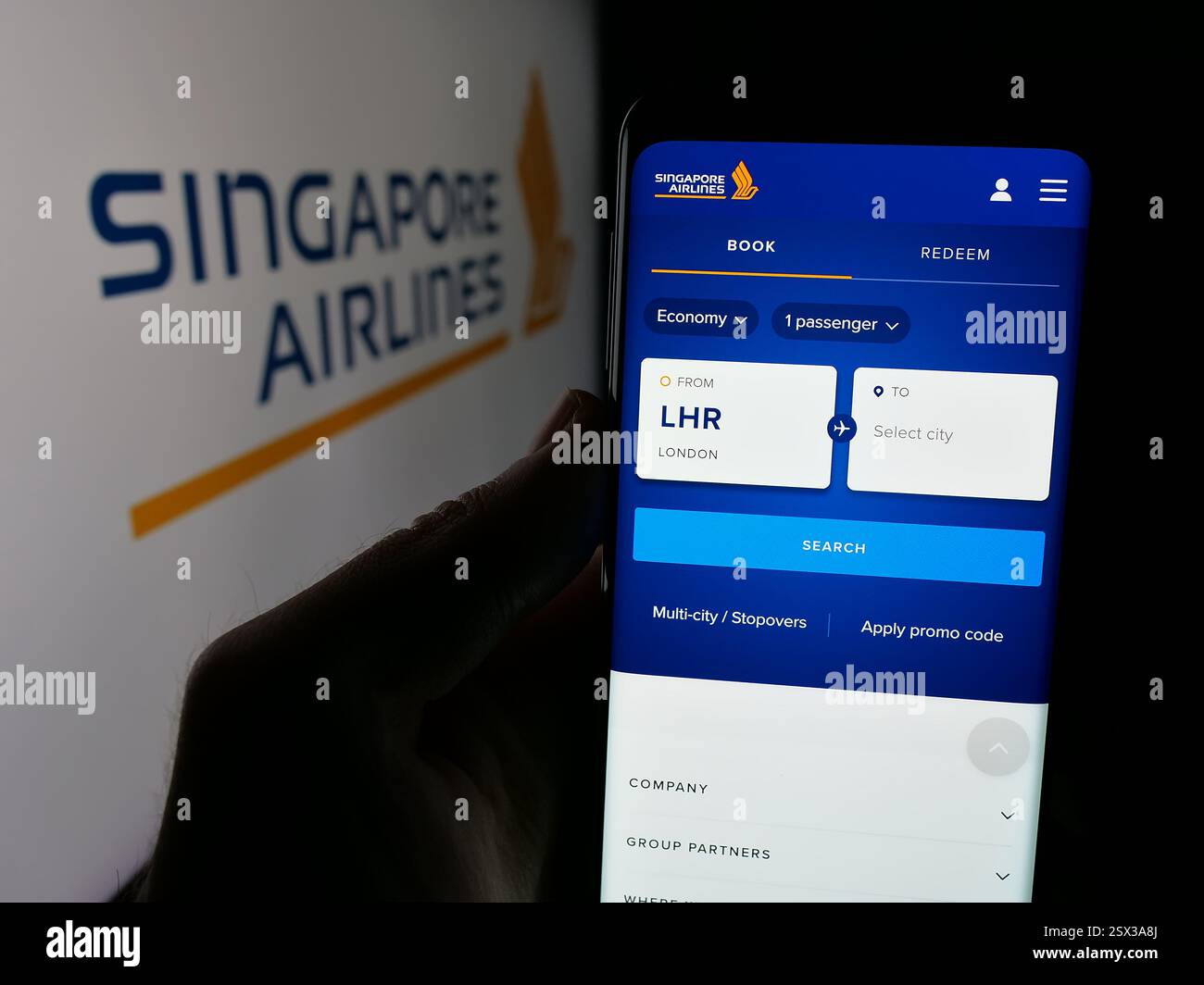 Germany. 17th Jan, 2025. In this photo illustration, smartphone with the web page of airline company Singapore Airlines Limited on screen with logo. (Credit Image: © Timon Schneider/SOPA Images via ZUMA Press Wire) EDITORIAL USAGE ONLY! Not for Commercial USAGE! Stock Photo