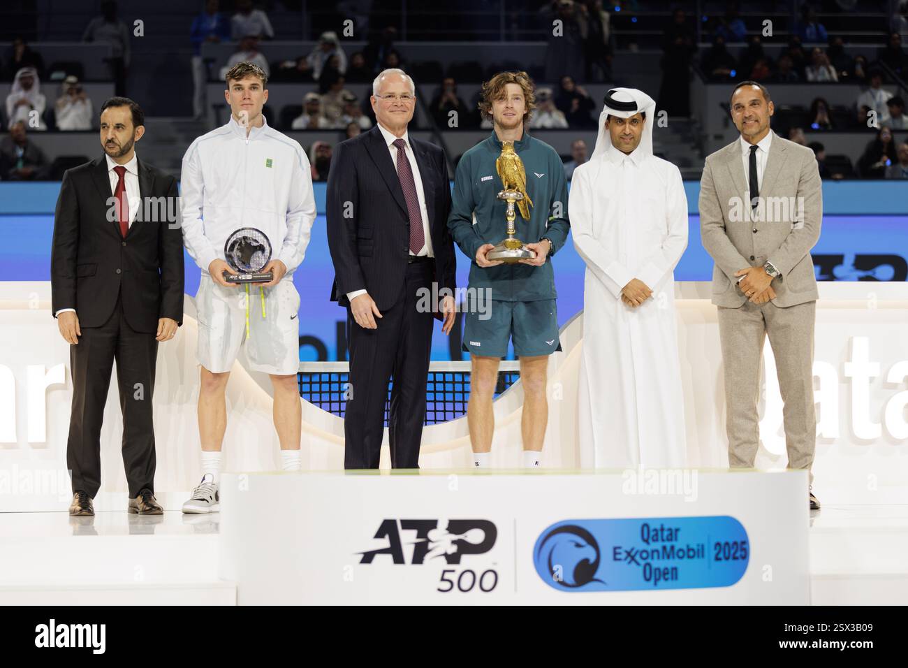Russia's Andrey Rublev (R) and Britain's Jack Draper pose on the podium ...