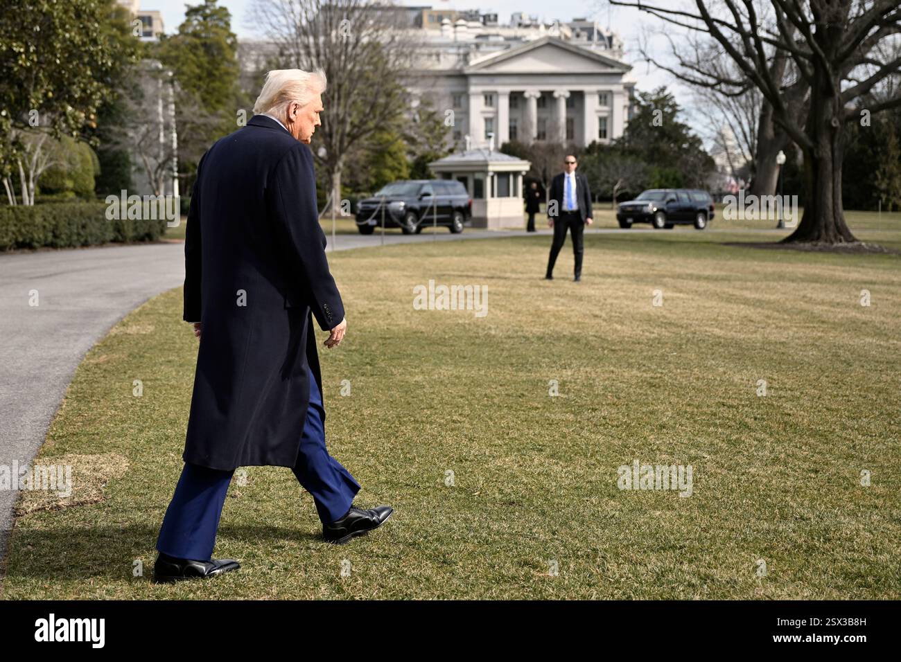 President Donald Trump walks on the South Lawn as he leaves the White ...