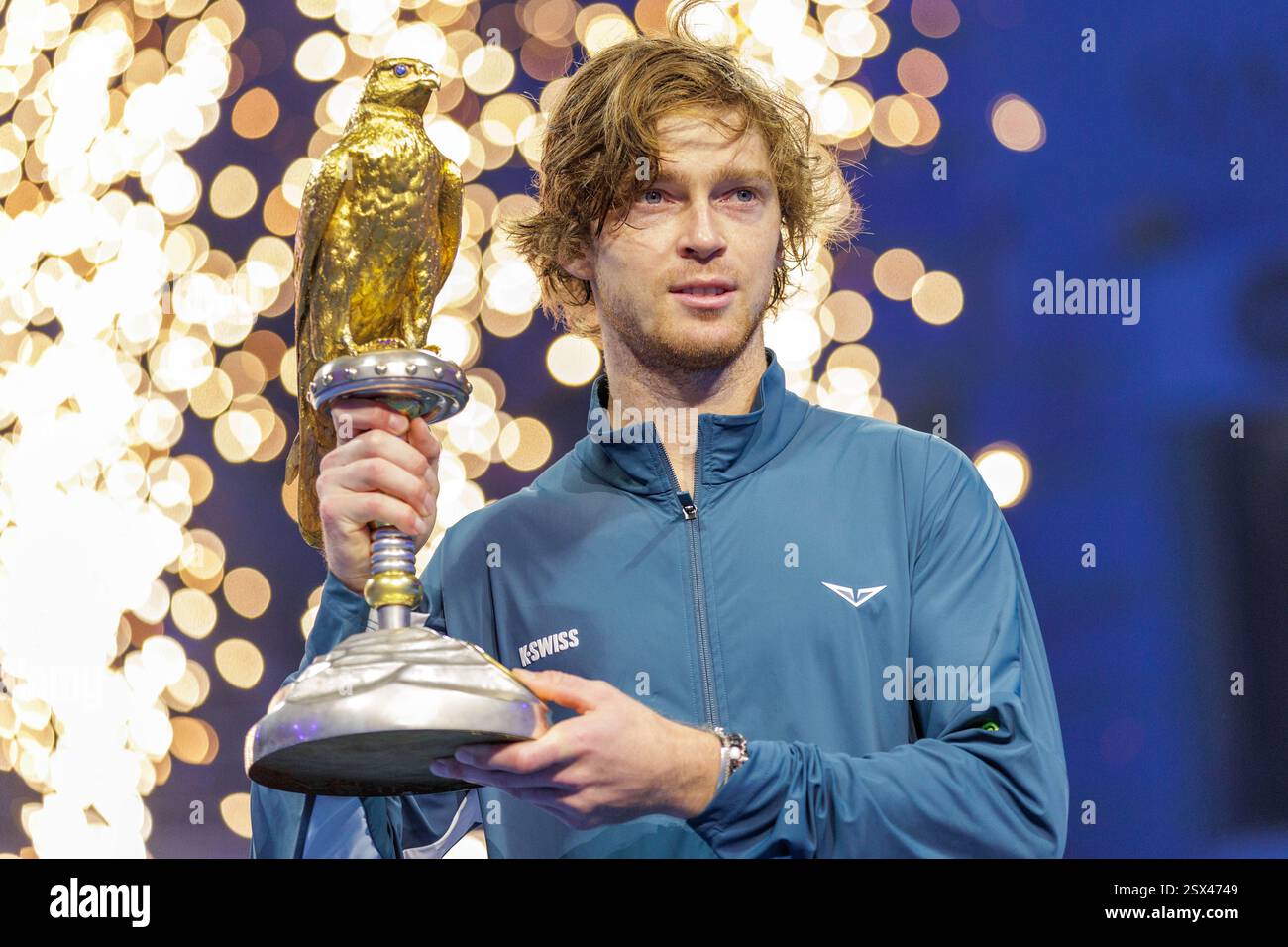 Rublev Doha Andrey Rublev of Russia celebrates with the trophy on the podium after ...