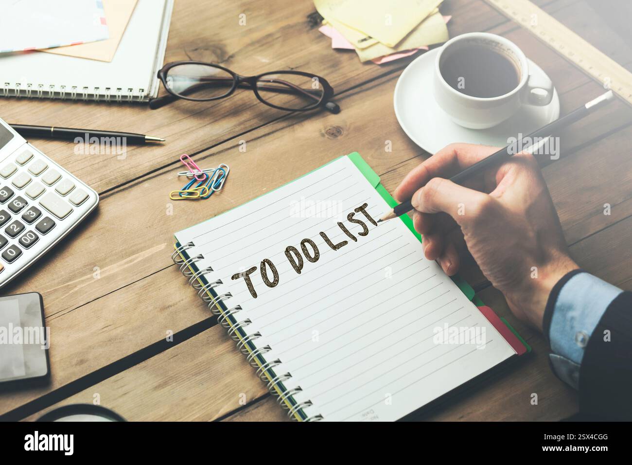 man written to do list text on notebook Stock Photo