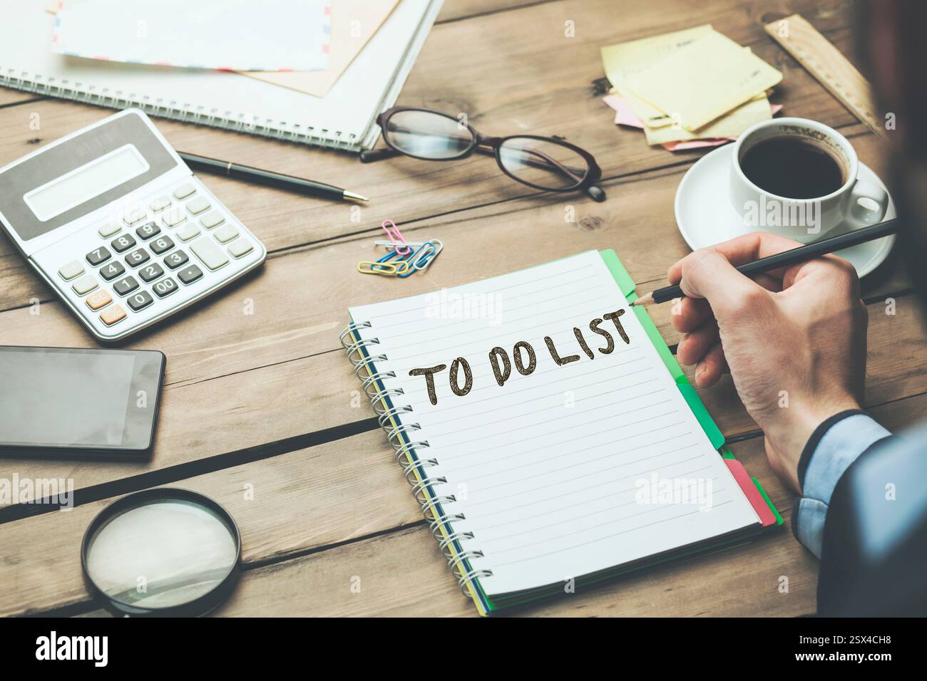 man written to do list text on notebook Stock Photo