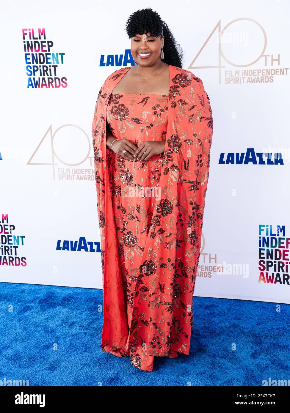 Natasha Rothwell walking on the red carpet at the 2025 Film Independent Spirit Awards held on
