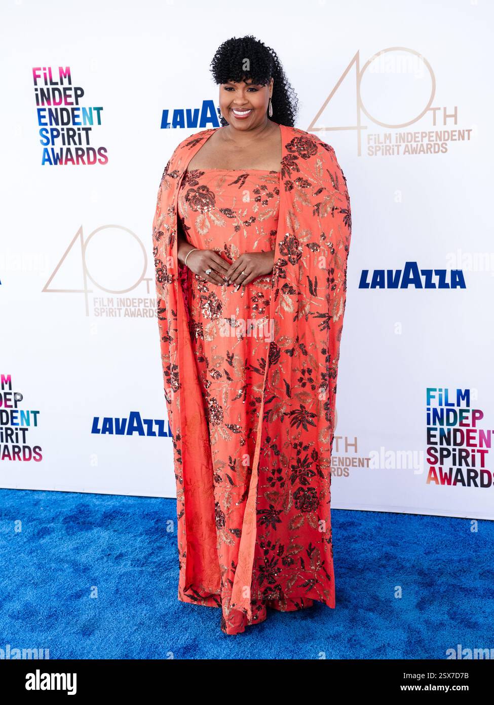 Natasha Rothwell walking on the red carpet at the 2025 Film Independent ...
