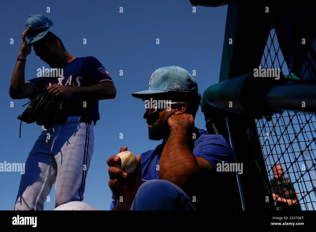 Texas Rangers third baseman Ezequiel Duran sits on the dugout steps in ...
