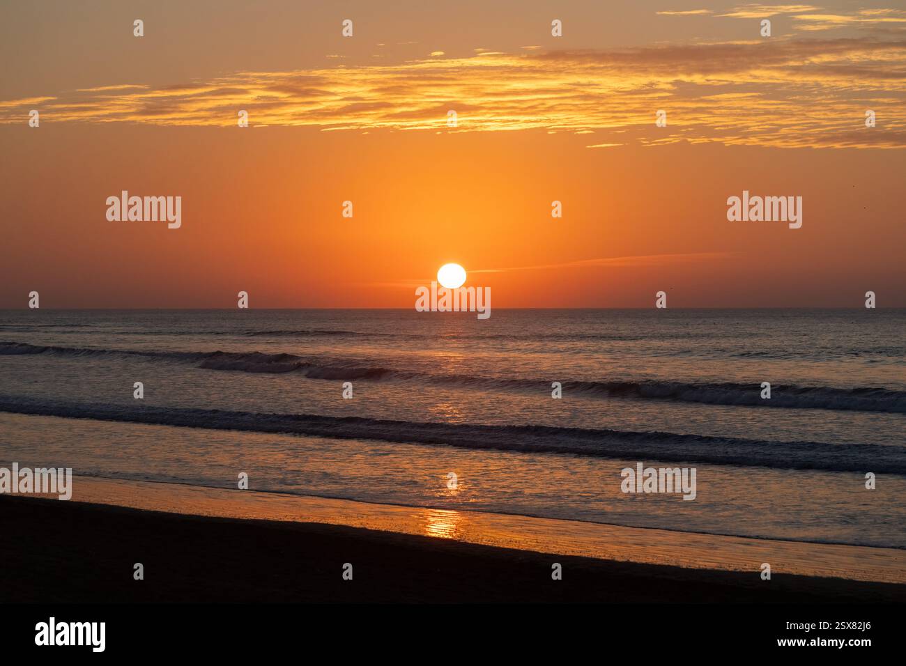 Orange sunset over Atlantic ocean in Morocco Stock Photo - Alamy