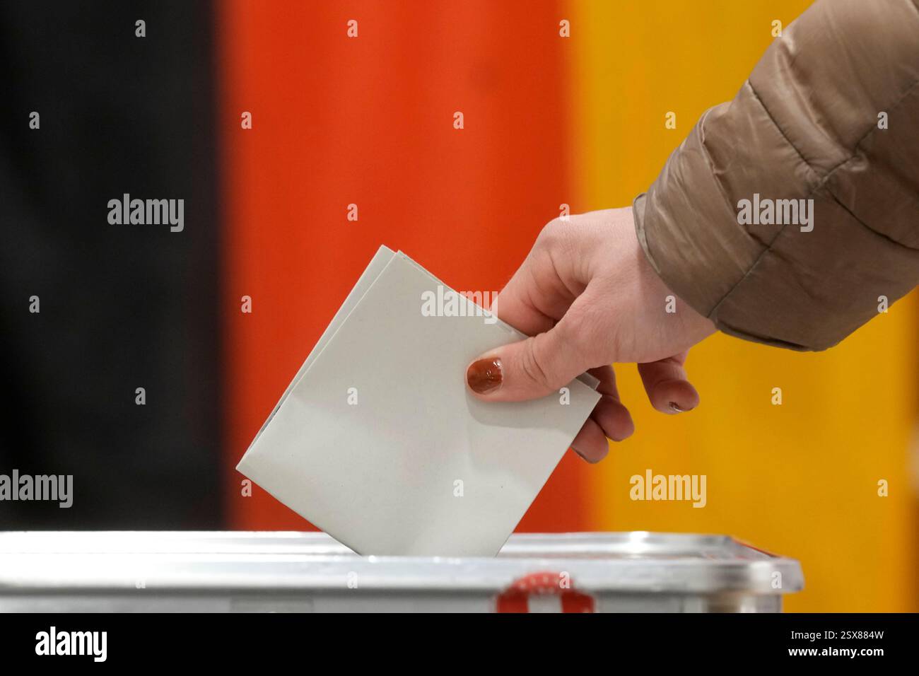 German Polling A resident casts a vote at a polling station in Berlin, Germany, Sunday ...