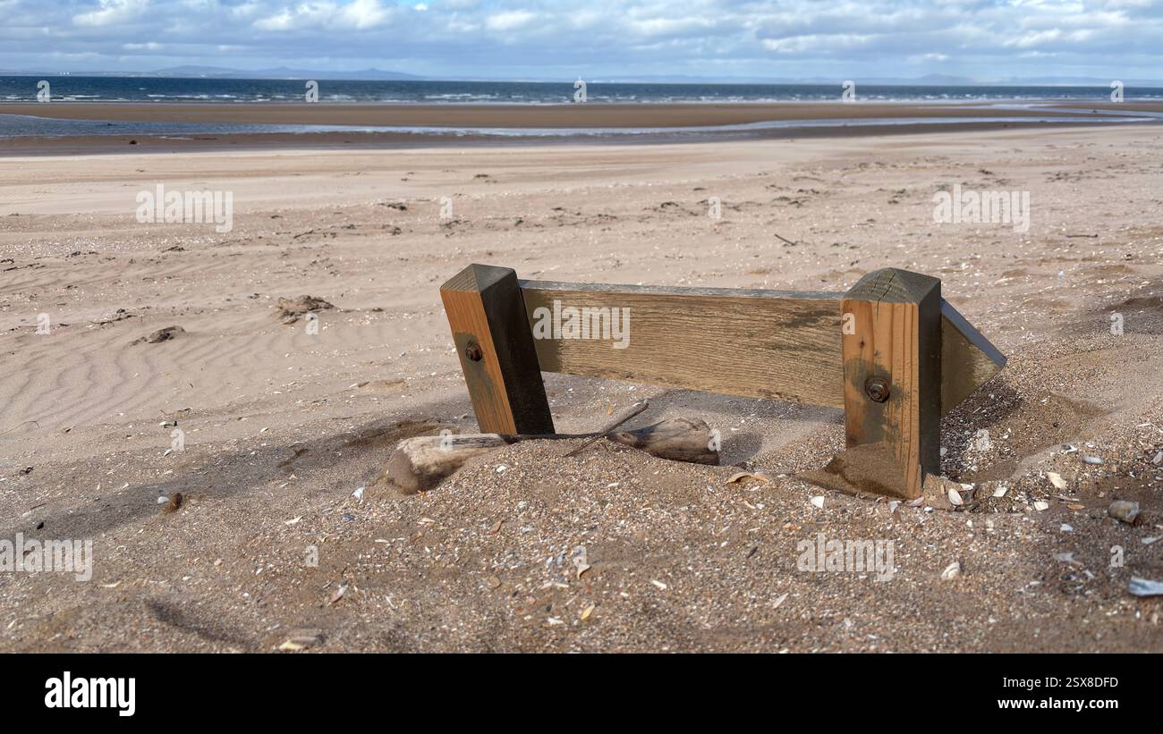 Aberlady Beach near Edinburgh in Scotland. Windswept beach on a bright Spring day. Light clouds, golden sand, sweeping coastline and sea shore - Smartphone Captured Stock Image